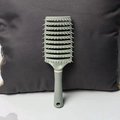 Vented hair brush with curved grey-green design and light bristles for scalp massage - Skeleton Brush / Mint Green