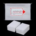 Primer plano de 1000 discos de algodón rectangulares para quitar esmalte y maquillaje - Toallitas para Uñas Duras (1000pcs) / Blanco