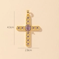 Detail view of a gold cross pendant with purple zircon and size specs 4.3cm by 2.8cm - Style C-Purple Zirconia Cross