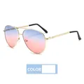 Classic aviator sunglasses featuring golden metal frames and blue-pink gradient lenses - Blue Pink