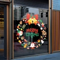 Christmas wreath window sticker with Santa and reindeer on shop glass storefront - Christmas Wreath 6119