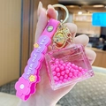 Pink pearl milk tea bear keychain with transparent Kelly bag charm and silicone wristband - Pearl Handbag - Rose Red
