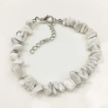 Macro detail of irregular white natural stone bracelet with adjustable silver clasp - Howlite