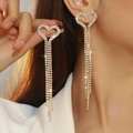 Golden heart earrings with rhinestone tassels shown on a model for a sparkling look - Gold Five-Line Tassel Heart Style (DTE1816404GL-W)
