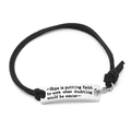 Detail of hand-woven black rope bracelet with engraved inspirational message metal plate - Black Rope-Hope is putting faith to work when doubting would be easier(G1181)