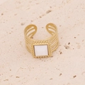 Detailed macro view of a gold-plated layered band ring featuring a white square gemstone - White Faux Pearl Square Hollow Style (5#)