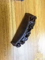 Intricate hollow-carved sandalwood massage comb in dark brown finish for hair health - Black Gold Sandalwood Carved Ruyi Peony