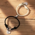 Magnetic couple bracelet set with sun and moon heart pendants on black and white woven cords - Black & White Braided - Sun Moon Heart Magnetic