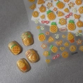 Close-up of 3D embossed pineapple nail art stickers with sweet summer dessert patterns - 3D Embossed Pineapple Fruit Series (CO-486)