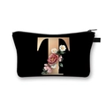 Black polyester pouch with golden letter T and pink floral print for makeup storage - Letter T