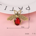 DIY gold bee charm with a large faceted red gem and intricate wing textures, model D1026 - Gold Wine Red Bee