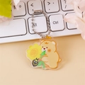 Porte-clés ours en acrylique jaune avec tournesol et abeille sur chaîne à billes argent - Ours miel