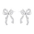 Macro detail of silver-finish bow-shaped stud earrings with polished metallic texture - VE1264 Silver Bow Stud Earrings