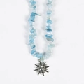 Irregular light blue crystal stone beaded necklace with a silver sun pendant charm - Aquamarine Sun