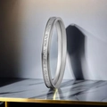 Polished silver stainless steel bangle engraved with sentimental quote on marble surface - XS / Quote Engraved Style / Steel