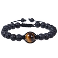 Close-up of 12mm tiger eye bead and porous lava stones on adjustable braided bracelet - Tiger Eye Bracelet