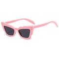 Pink cat-eye sunglasses for women with scalloped edges and gold metal accents on white background - Pink Frame Grey Lens