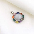 Detailed macro view of a silver pendant with colorful marquise stones on beige fabric - Silver Colorful Marquise Gemstone Charm