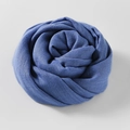 Rolled cotton linen scarf in solid blue color featuring a soft textured fabric design - Dark Blue