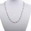 Detail of colorful beads on a silver stainless steel necklace shown on a display stand - Silver + Colorful 2