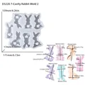 Detailoverzicht van de 7-cavity konijn siliconen mal met harsmaten en gewichten - Multi-Cavity Konijn Hart Stijl (D5220)