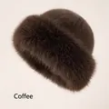 Detailed texture of coffee brown faux mink fur on a thick winter plush bucket hat - Coffee