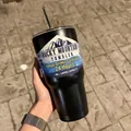 Close-up of matte black 30oz tumbler made of 18/8 stainless steel with a metal straw - Single Cup + Stainless Steel Straw / Textured Black