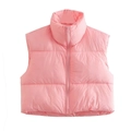 Close-up of pink puffer vest featuring a stand-up collar and matching zipper detail - Pink