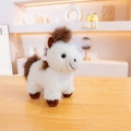 Peluche a forma di pony bianco con criniera e coda marrone scuro su tavolo di legno - 25cm / Bianco
