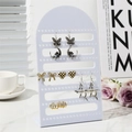 L-shaped 126-hole white plastic earring display stand with elegant arched storage design - White