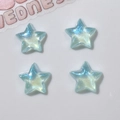 DIY craft kit featuring four aurora blue gradient resin star charms with glitter finish - Mini Blue