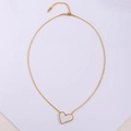 Detail of gold titanium heart necklace showing lobster clasp and S.steel engraving - White Heart