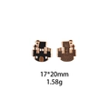 Macro view of black and gold castle alloy pendant with size and weight details - Castle