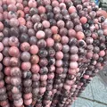 Detailed view of polished natural pink zebra stone round beads for DIY jewelry making - Natural Pink Zebra Stone 4mm (Approx. 90pcs) Strand
