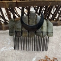 Close-up of natural labradorite stones and black crescent moon on a handmade hair comb - Grey Labradorite Black Moon