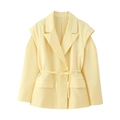 Detail of light yellow blazer featuring a classic lapel and matching waist tie belt - S / Yellow