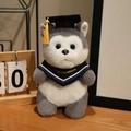 Peluche a forma di husky con toga nera e cappello da laureato con nappa dorata - Husky con sciarpa blu / 20cm