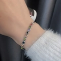 Colorful crystal titanium steel bracelet with multi-color round gemstones on wrist - Silver