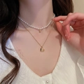Double-layered pearl necklace with a golden heart pendant and delicate chain - Heart Bead Artificial Pearl Necklace Set
