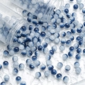 Macro shot of 10mm blue and white gradient glass beads with ice crackle texture - 10mm / Ink Blue