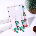 Christmas holly leaf earrings with red berries on decorative card with pine cones - Red Diamond Leaf