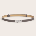 Detail view of grey slim waist belt featuring silver twist lock and crossgrain leather texture - (Silver Buckle) Cross Pattern Lock Adjustable Belt (Grey)