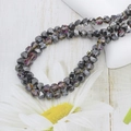Detailed close-up of 6mm faceted crystal glass beads with iridescent metallic coating - 6mm (approx. 100pcs) / Half Black Interior Multicolor