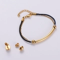 Parure di gioielli dorati con bracciale a doppio filo nero e orecchini a bottone dorati - Set (AML-MSA-TZ-122) / Oro