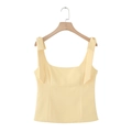 Pale yellow square neck camisole top with bow straps on a wooden hanger - XS / Light Yellow