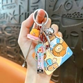 Portable cartoon food themed nail clipper and ear pick keychain set - Donut Bear