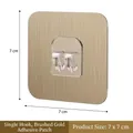 Klebehaken gebürstetes Gold 7x7cm mit transparentem Einzelhaken für eine bohrfreie Montage - 7*7 Gebürstetes Gold Krallenhaken