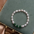 Baroque pearl bracelet with green agate beads and sparkling spacers on velvet cushion - Green Agate Pearl