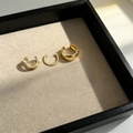 Set di tre ear cuff placcati in oro con design intrecciato e finiture lucide a onda - Set di 3 Ear Cuff Oro (Placcato Oro 18K)
