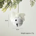 White Christmas metal bell ornament with sparkling bow and star cutouts hanging on a tree - 6x6 Style / White